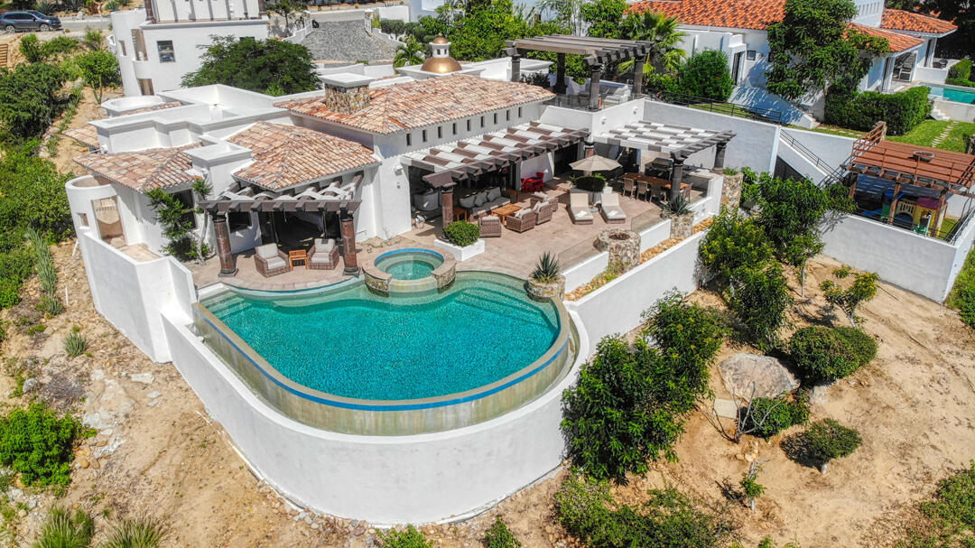 Cabo Luxury Park Hyatt Villa Mariposa is a stunning three-bedroom oceanfront retreat designed for those seeking privacy, tranquility, and timeless Baja elegance. Showcasing classic Hacienda-style architecture, the villa features rich wood furnishings, warm finishes, and tasteful pops of color that create an inviting and sophisticated atmosphere throughout.Wake up to the soothing sound of the waves and spend your days enjoying the private pool and hot tub overlooking the Sea of Cortez. The expansive terrace provides the perfect setting for al fresco dining, sunset cocktails, or simply relaxing while watching whales pass by during the season.The gourmet kitchen is equipped with high-end appliances and complemented by a charming breakfast nook. See more... The open-concept living and dining areas seamlessly connect to the spacious terrace, maximizing indoor-outdoor living and capturing breathtaking ocean for sale