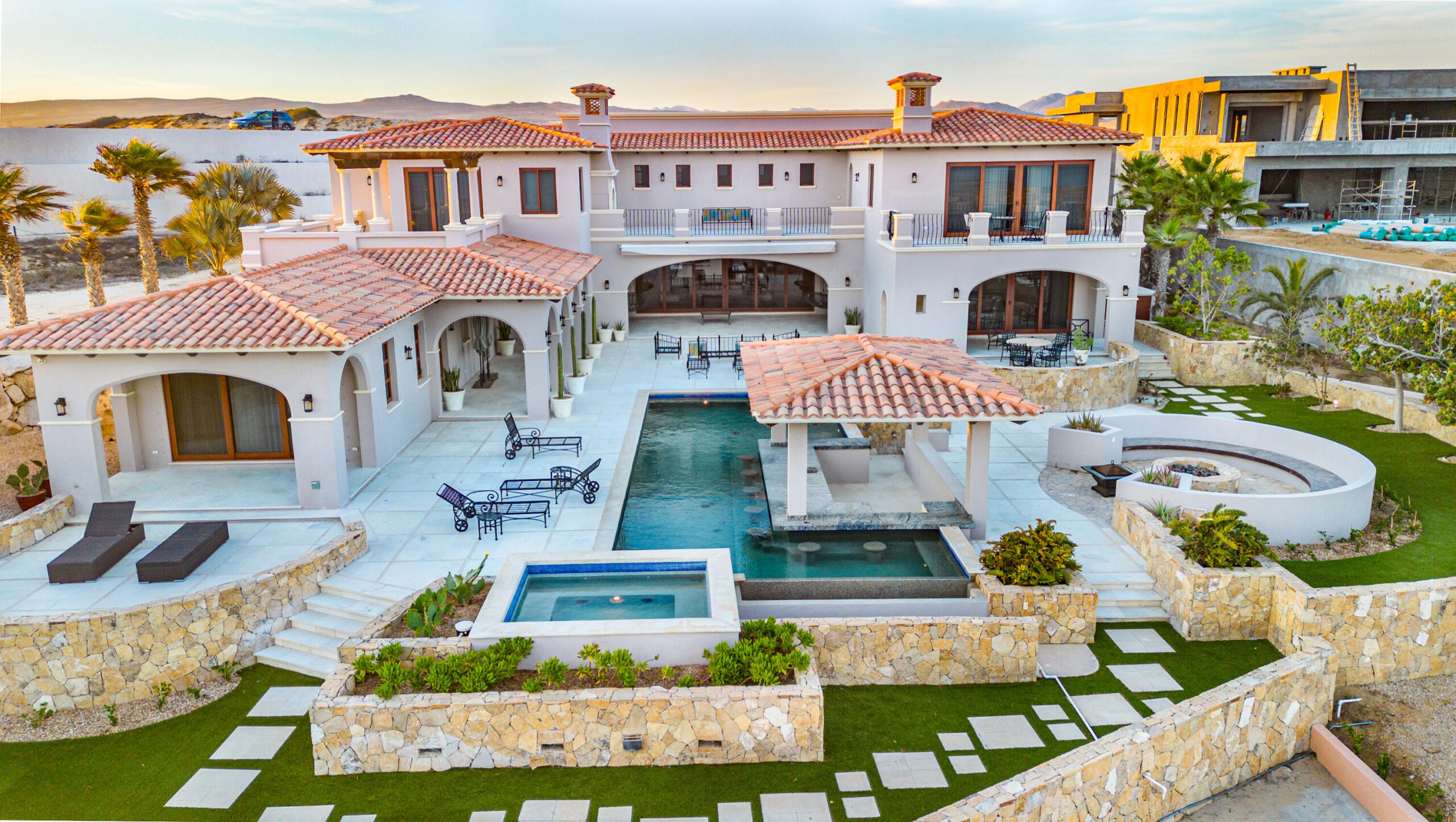 Cabo Luxury Coronado The Luna 5 bed home plan. The floor plan boasts a great room with vaulted ceilings over the living/dining area which looks out over the large covered terrace and the hand-made infinity edge pool beyond. The chefs kitchen with huge island with seating boasts Wolf and Sub-Zero appliances. The master and guest master have large ensuite baths w/ shower and tubs, and also both have ocean for sale