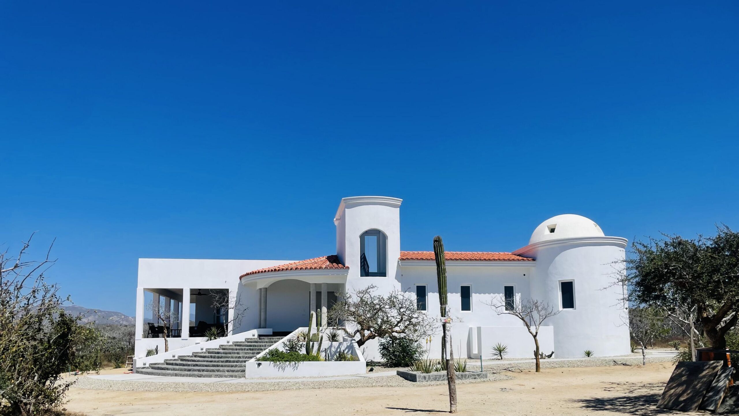 Cabo Luxury Migrino This is an estate property with full ownership.It is on a 2 1/2 acre lot and has a Main house and a Beautiful Guest house. Both are high end construction and architecturally designed for comfort and a tranquil Life Style with a total of 6311 sq ft of single story living. Just a stone throw from the beach. If you miss seeing these homes you will miss something Very Unique in a growing community on the Pacific Corridor for sale