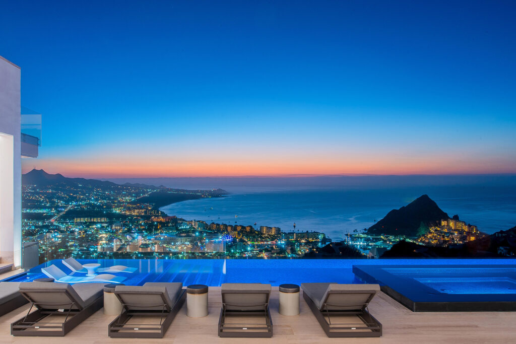 Cabo Luxury Section 4- Las Canadas Discover refined indoor-outdoor living at Cañada 9, set within Querencia, San Jose del Cabo's premier private golf community. Soaring beamed ceilings, walls of pocket glass, and luminous marble floors define an open great room that flows effortlessly to the terrace, infinity-edge pool, and stone-clad water feature -- all framed by panoramic Sea of Cortez and mountain – 625 Camino del Cielo, Cabo San Lucas, BS