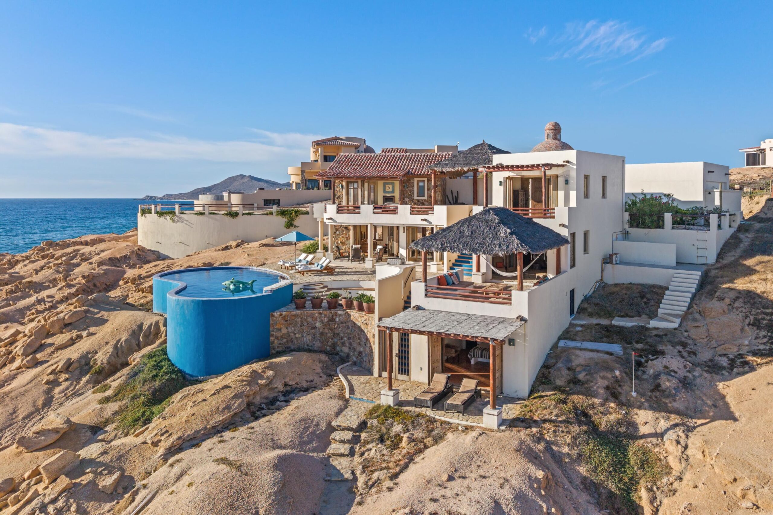 Cabo Luxury Section 4- Las Canadas Discover refined indoor-outdoor living at Cañada 9, set within Querencia, San Jose del Cabo's premier private golf community. Soaring beamed ceilings, walls of pocket glass, and luminous marble floors define an open great room that flows effortlessly to the terrace, infinity-edge pool, and stone-clad water feature -- all framed by panoramic Sea of Cortez and mountain for sale