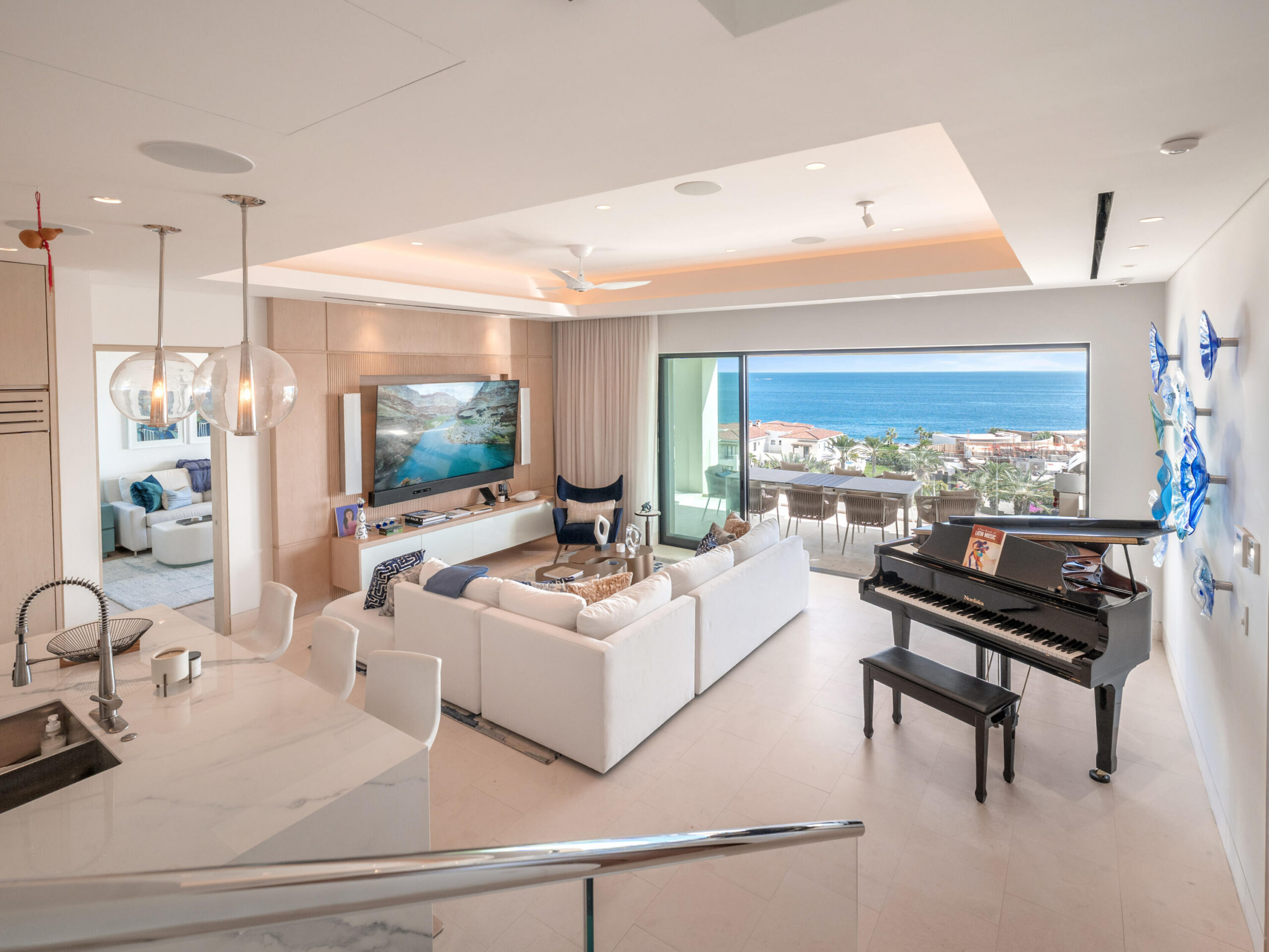 Cabo Luxury Cove Club Bungalow 10 in the gated Cove Club offers 4 bedrooms and 4 bathrooms with an open-concept design that seamlessly connects the kitchen, dining, and living areas to an expansive outdoor terrace. Ideal for entertaining and indoor-outdoor living. Enjoy sweeping, unobstructed for sale