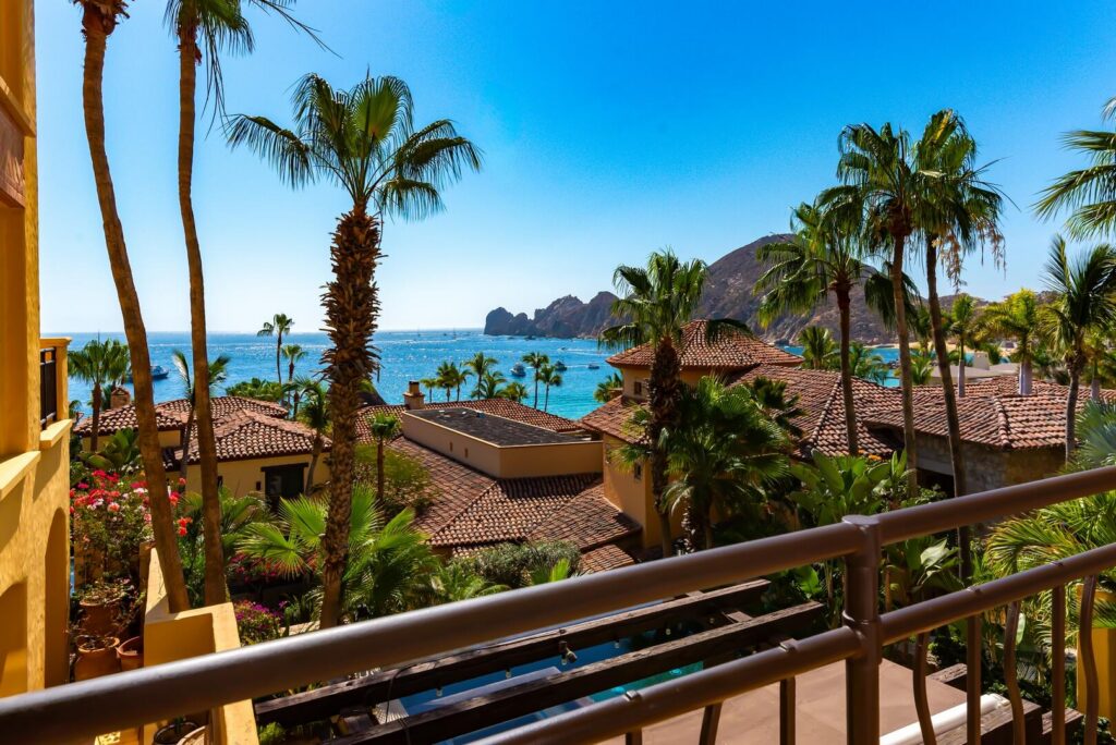 Cabo Luxury Hacienda Csl Prime corner unit in Building 5 -- Hacienda Beach Club's most coveted location, steps from the beach club, spa & gym. This stunning 3-bedroom residence offers wraparound natural light, soaring wood-beamed ceilings, a chef's kitchen with granite island, and an open-concept living area with warm, resort-style finishes throughout. Enjoy front-row access to the iconic infinity pool overlooking the Sea of Cortez, lush tropical grounds, and Cabo's famous arch all from one of the community's most connected addresses. Priced as one of the top three 3BR values in all of Hacienda, and a proven rental performer with a loyal guest following. Whether you're seeking a full-time retreat, a vacation escape, or a smart addition to your portfolio this is your entry point into one of Los Cabos' top addresses – Hacienda Beach Club, Cabo San Lucas, Cabo San Lucas, BS