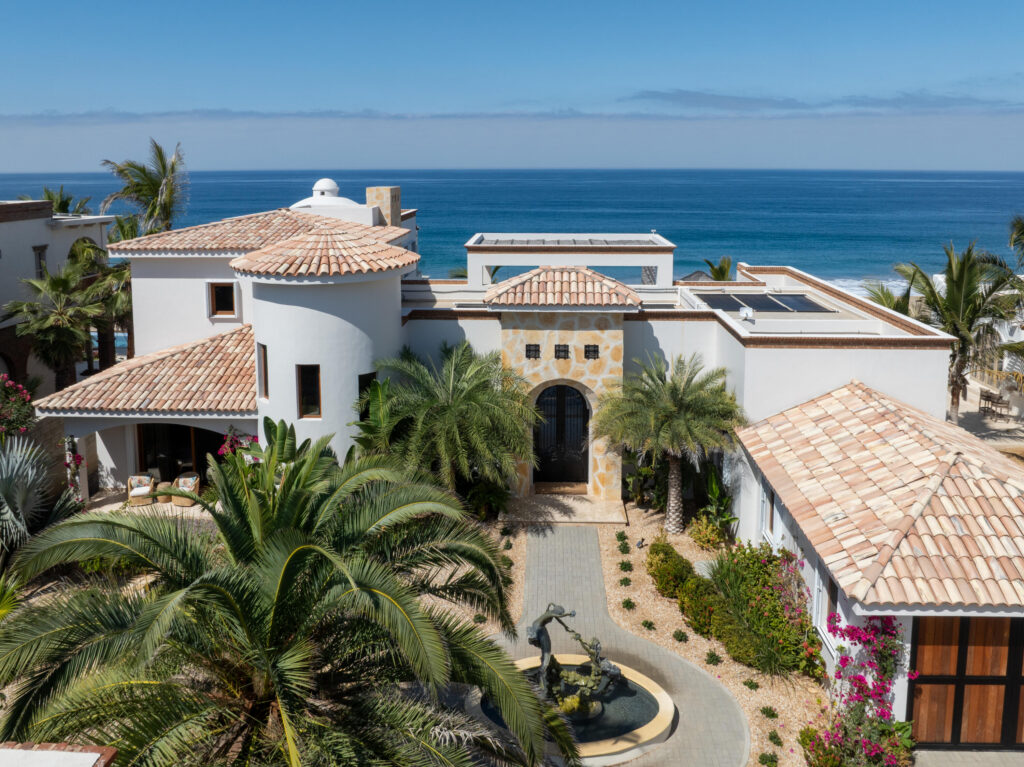 Cabo Luxury Rancho Nuevo This is a one of a kind estate property consisting of two oceanfront homes. The oceanfront estate with 3 grand bedrooms/4.5 baths, interior/exterior living, 2 kitchens, 2 dining areas, butler's pantry, 2 laundry rooms, and attached garage. Two primary suites are situated upstairs and downstairs.. No expense was spared in exquisite high end finish out such a brick bovedas, brick barrel kitchen ceiling, Heston appliances.Onyx countertops with hidden electrical outlets. This estate was built with the highest quality of materials and design. Dual pane hurricane doors and windows plus hurricane shutters encompassing even the covered patio. The orientation is perfectly situated to capture the Pacific, which sits on 3000m2 lot, walled with electronic gated car gate located high on a bluff. See mo Imagine only 35 minutes from Cabo San Lucas and 15 minutes from Todos Santos, lies the oceanfront gated community known as Rancho Nuevo. This one of a kind estate property consists of an oceanfront home with 3 oversized suites all with luxurious en suite bathrooms, walk-in closets, of which two are oceanfront. The upstairs primary has two terraces, one with built in seating compete with a fire pit. The home was constructed with the highest quality materials and orientation to take in the ocean – Ocean Drive, Pacific, BS