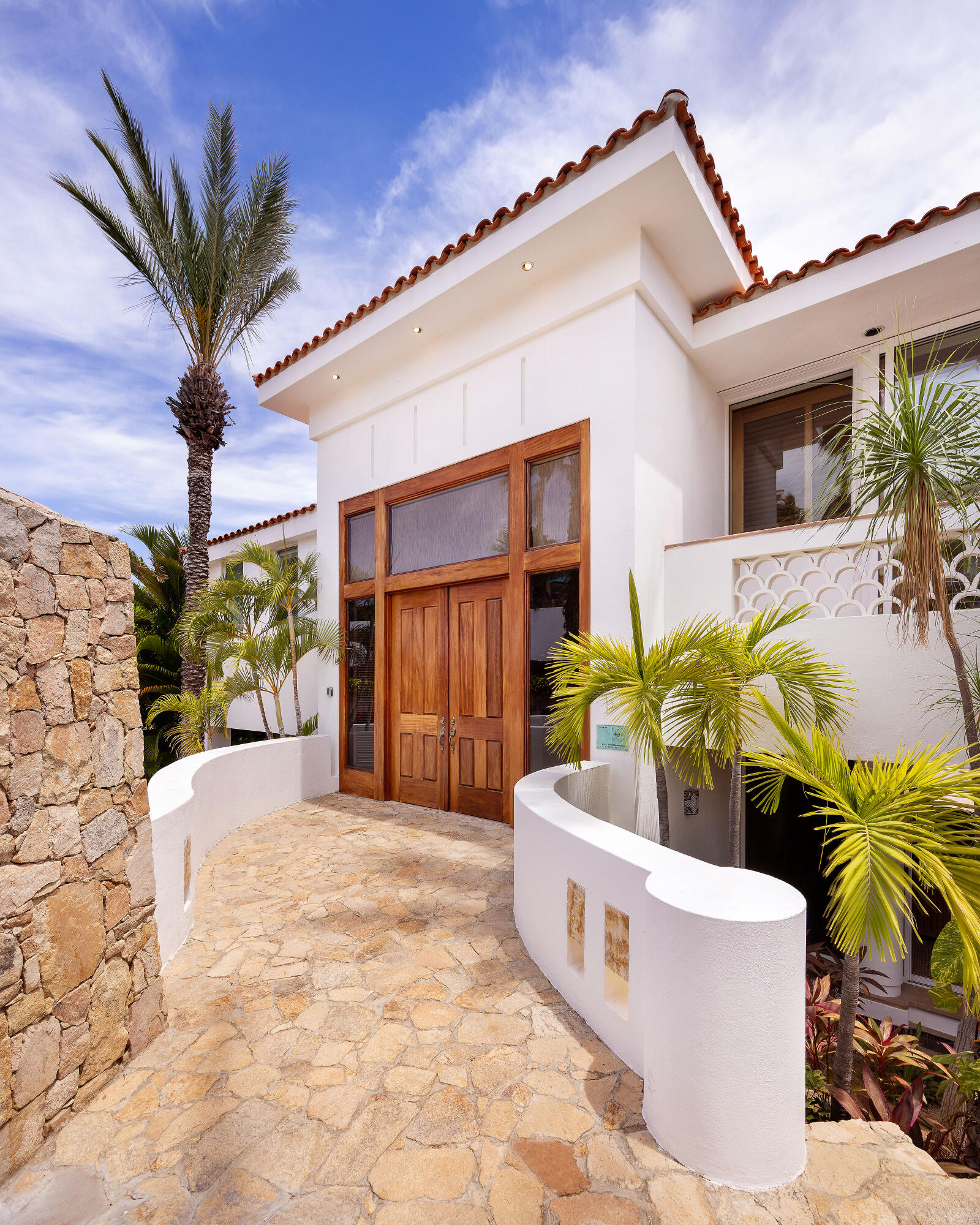 Cabo Luxury Section 4- Las Canadas Discover refined indoor-outdoor living at Cañada 9, set within Querencia, San Jose del Cabo's premier private golf community. Soaring beamed ceilings, walls of pocket glass, and luminous marble floors define an open great room that flows effortlessly to the terrace, infinity-edge pool, and stone-clad water feature -- all framed by panoramic Sea of Cortez and mountain for sale