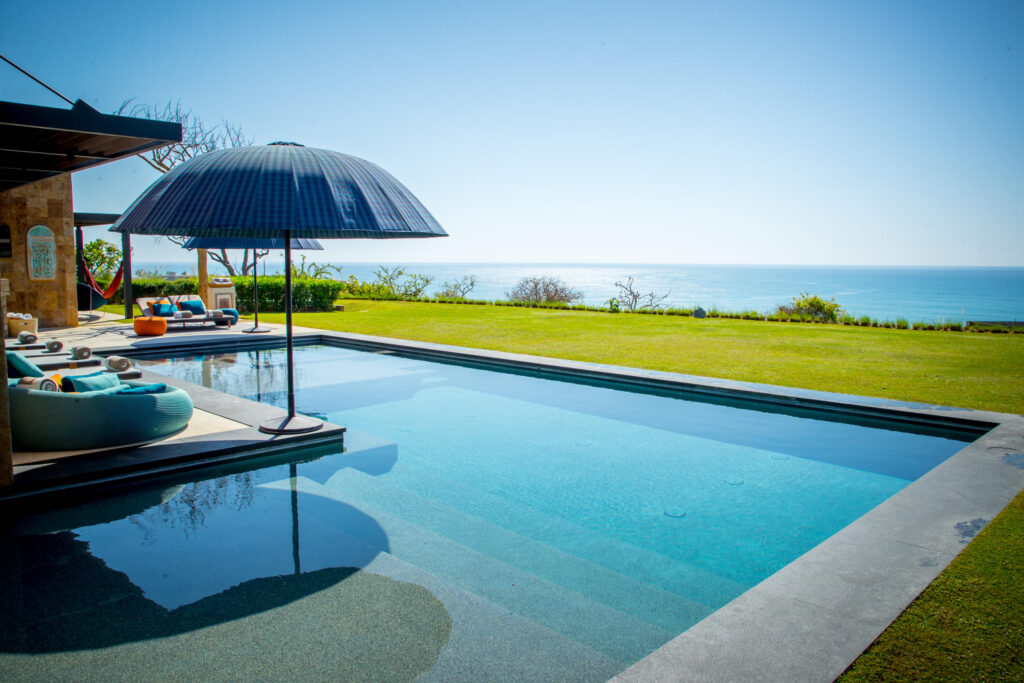 Cabo Luxury Coronado The Luna 5 bed home plan. The floor plan boasts a great room with vaulted ceilings over the living/dining area which looks out over the large covered terrace and the hand-made infinity edge pool beyond. The chefs kitchen with huge island with seating boasts Wolf and Sub-Zero appliances. The master and guest master have large ensuite baths w/ shower and tubs, and also both have ocean for sale