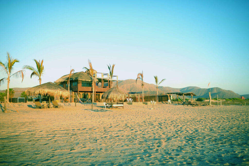 Cabo Luxury Las Tunas The Nacuii Residence is a refined luxury home crafted to exceed the expectations of even the most discerning buyer. Nestled on a generous and private 3,000 m² lot (0.73 acres), it's just a short, effortless stroll to the untouched, sandy shores of Las Tunas — perfect for enjoying the serene coastal landscape and dramatic sunsets. The home offers a thoughtful layout with 3 spacious bedrooms, a separate studio, a cozy TV lounge, and 6 full bathrooms, including two principal suites, a guest room, a detached studio, and a dedicated media or family room. Expansive sliding glass doors invite natural light throughout the interiors while showcasing tranquil garden for sale