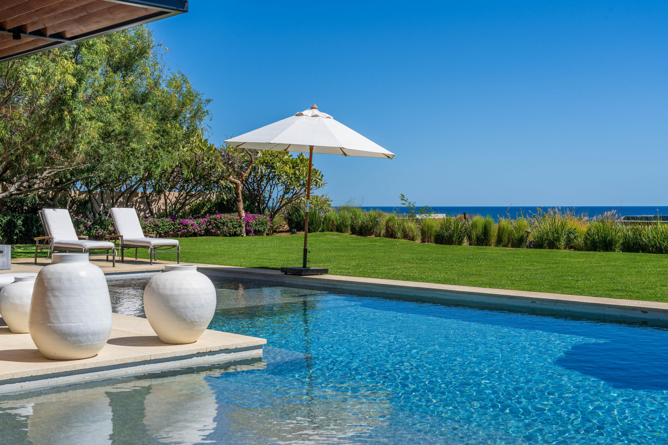Cabo Luxury Coronado The Luna 5 bed home plan. The floor plan boasts a great room with vaulted ceilings over the living/dining area which looks out over the large covered terrace and the hand-made infinity edge pool beyond. The chefs kitchen with huge island with seating boasts Wolf and Sub-Zero appliances. The master and guest master have large ensuite baths w/ shower and tubs, and also both have ocean for sale